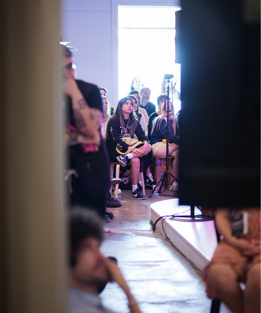WIP audience attentively watching the talk
